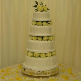 fwthumb4 tier cake filled with roses.jpg